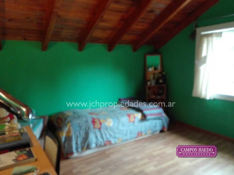 C92 amplia casa con quincho en barrio tres cerros