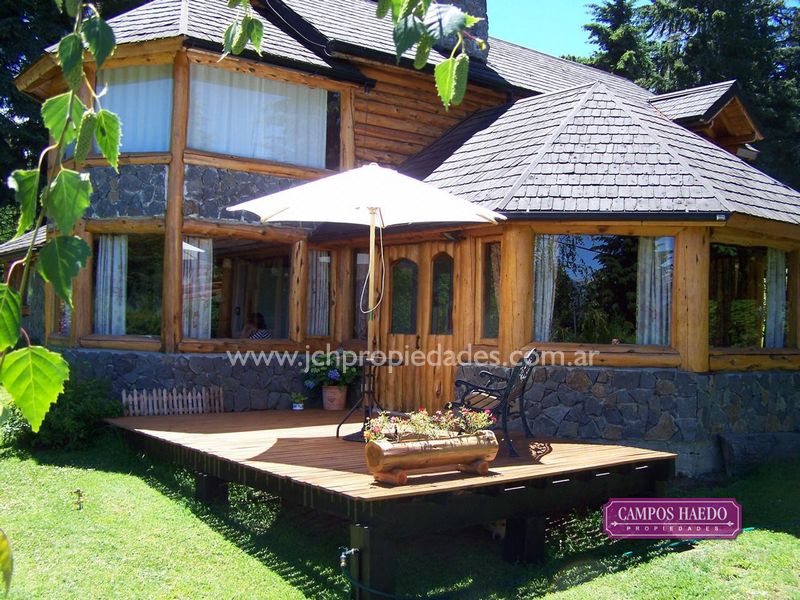 C89 casa de troncos en altos de manzano