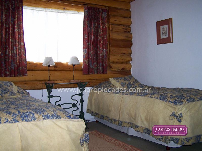 C89 casa de troncos en altos de manzano